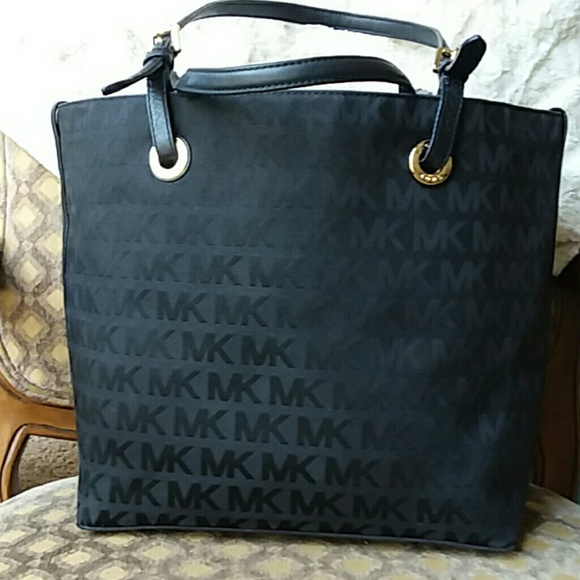 Michael Kors Handbags - SOLD!!  Michael Kors Black & red LV together